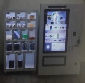 Industrial vending machine with slave locker cabinet dispensing spare parts and PPE